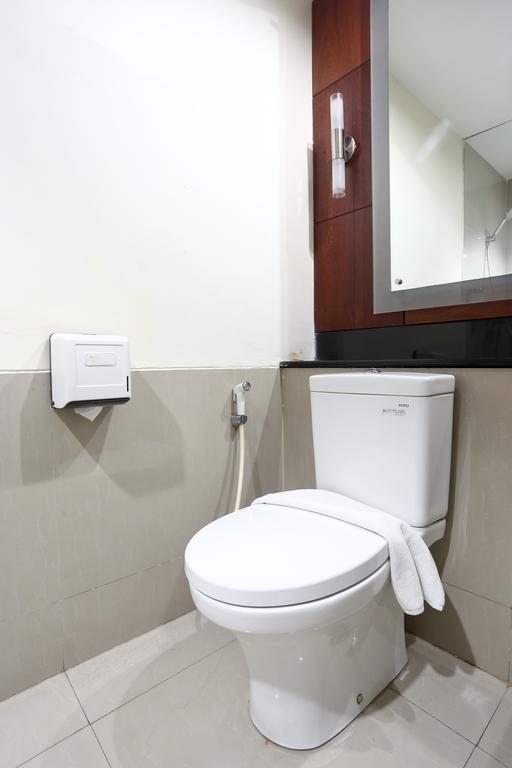 Zen Rooms Legian Dewi Sri Kuta Lombok Habitación foto